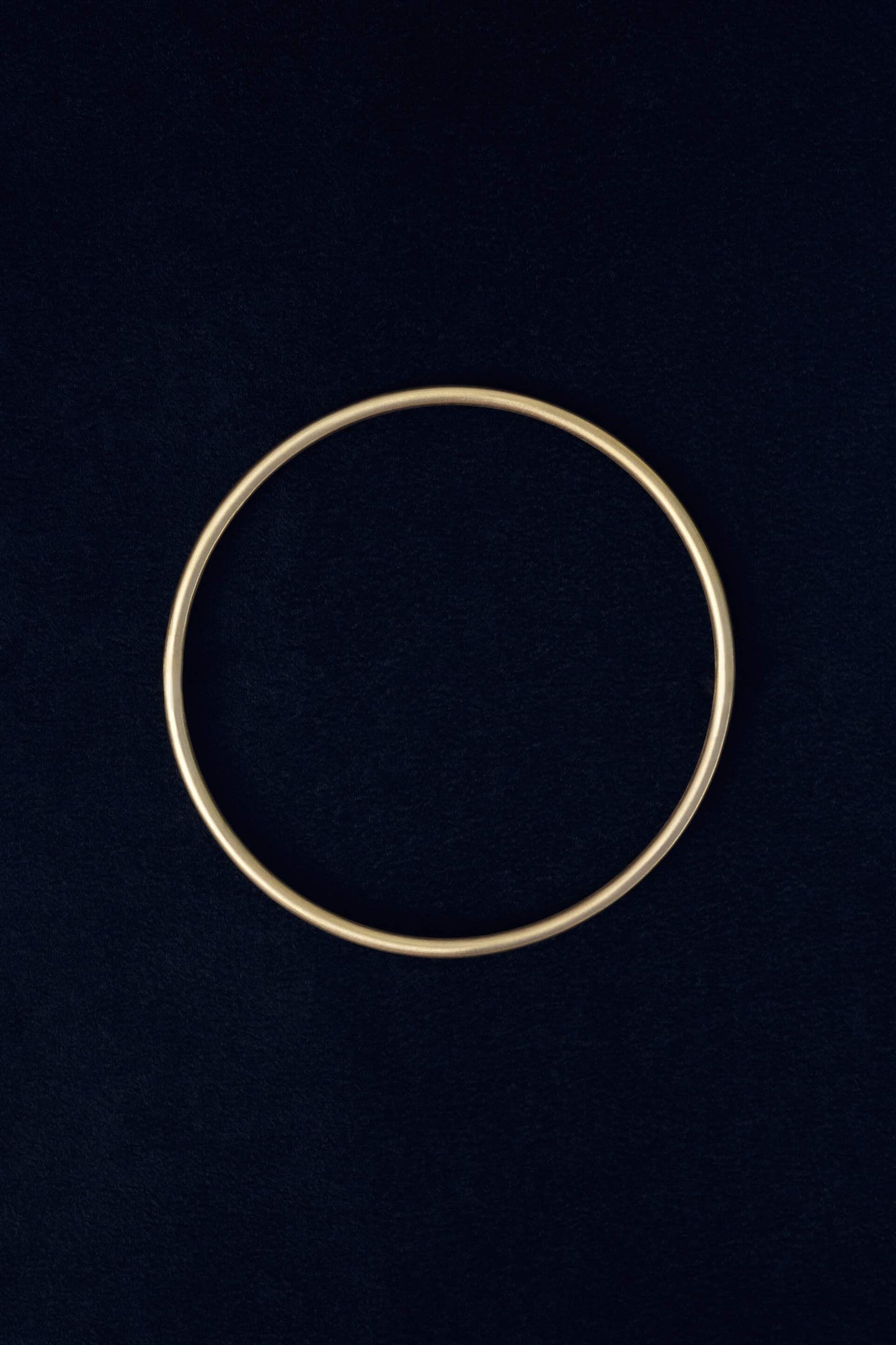 Tiana Marie Combes Classic Bangle in 14k Yellow Gold.