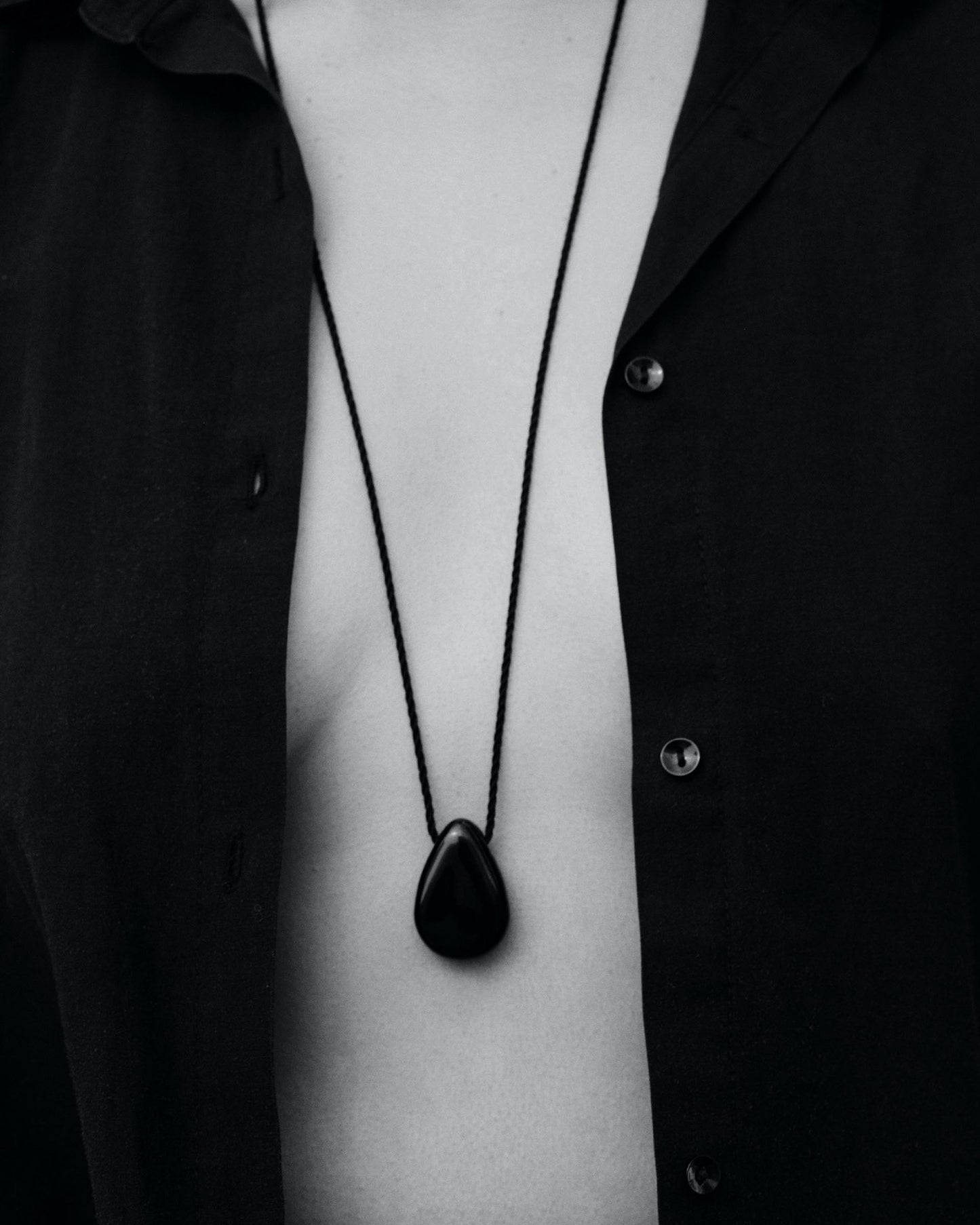 Tiana Marie Combes Rein Pendant in Onyx Glass on Black Silk.