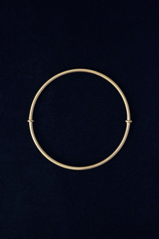Tiana Marie Combes Roman Bangle in 14k Yellow Gold. 